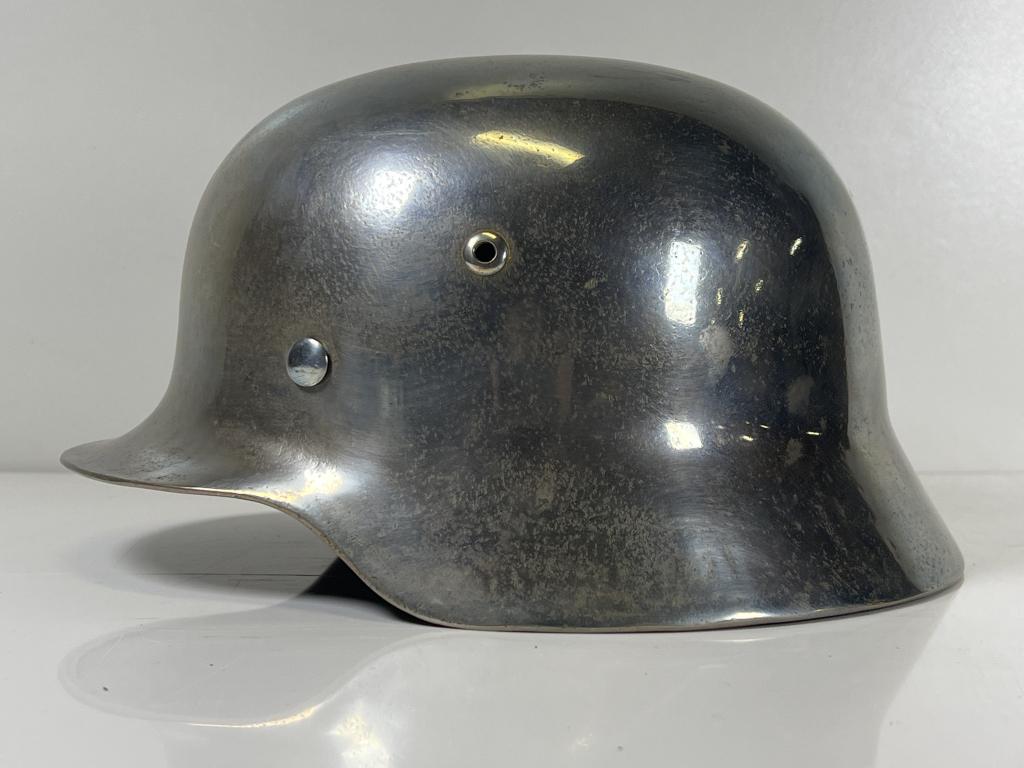 WW II German Military Chrome Parade Helmet: WW II German Military Chrome Parade Helmet with head liner and strap. Nice. See Photos