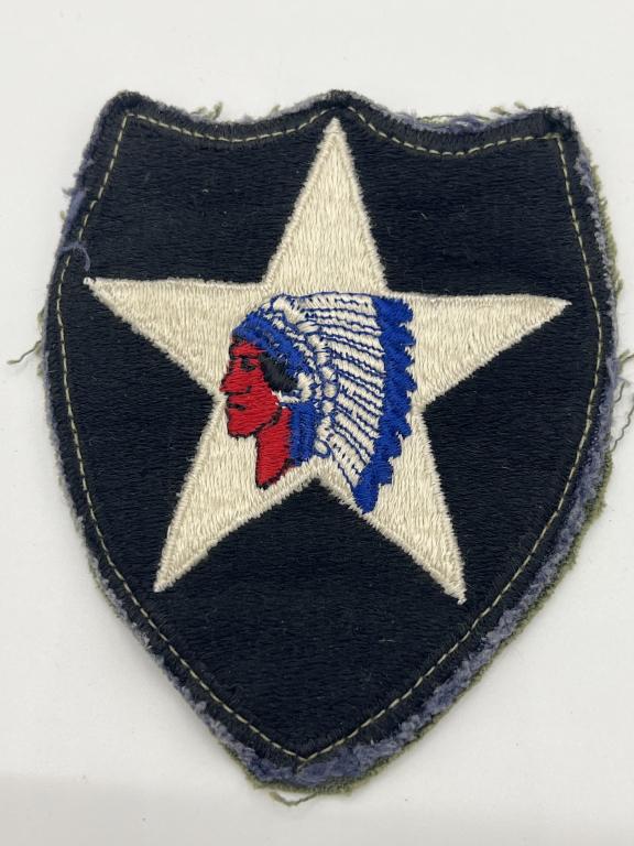 U.S. Military - Army Korean Era Patch +: U. S. Army 2nd Infantry Korean Era shoulder patch. This is a Camp Red Cloud Thick fabric patch embroidered with a star and a chief. The wool felt-like background fabric is backed with Army Green mater