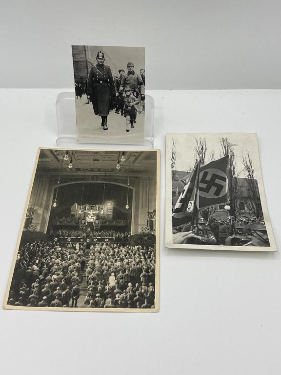 WW II German - SA Rally Pictures(3): Lot of 3 SA Rally pictures. A 3x3 1/2 " photo of a German Policeman with Junior SA men in uniform .A photo of SA Men with Flags in uniform at a rally. Back of this photo has original photo stamp. The 