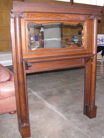 Lot: 38: Antique wood fireplace mantel with mirror
