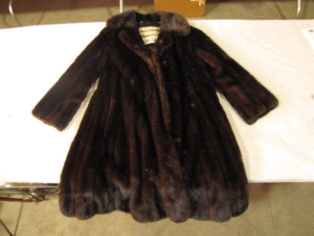 Pierre Cardin Bonwit Teller mink coat: Remeasured. Edit on June 14 @ 10:06 am est: Shoulder seam to shoulder seam = 14.5” Collar seam to end of sleeve = 25” Length is actually 38" top of collar to bottom of coat.