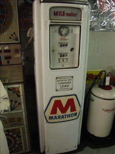 Tokheim Corp Mile-Maker Gas Pump: Tokheim Corp Mile-Maker Fuel Pump Model 39, Serial # 911493-8-47. White porcelain with glass facing. Glass fuel meter. Amount of sale, Gallons Delivered and Cents per Gallon gauges. Marathon sticker w