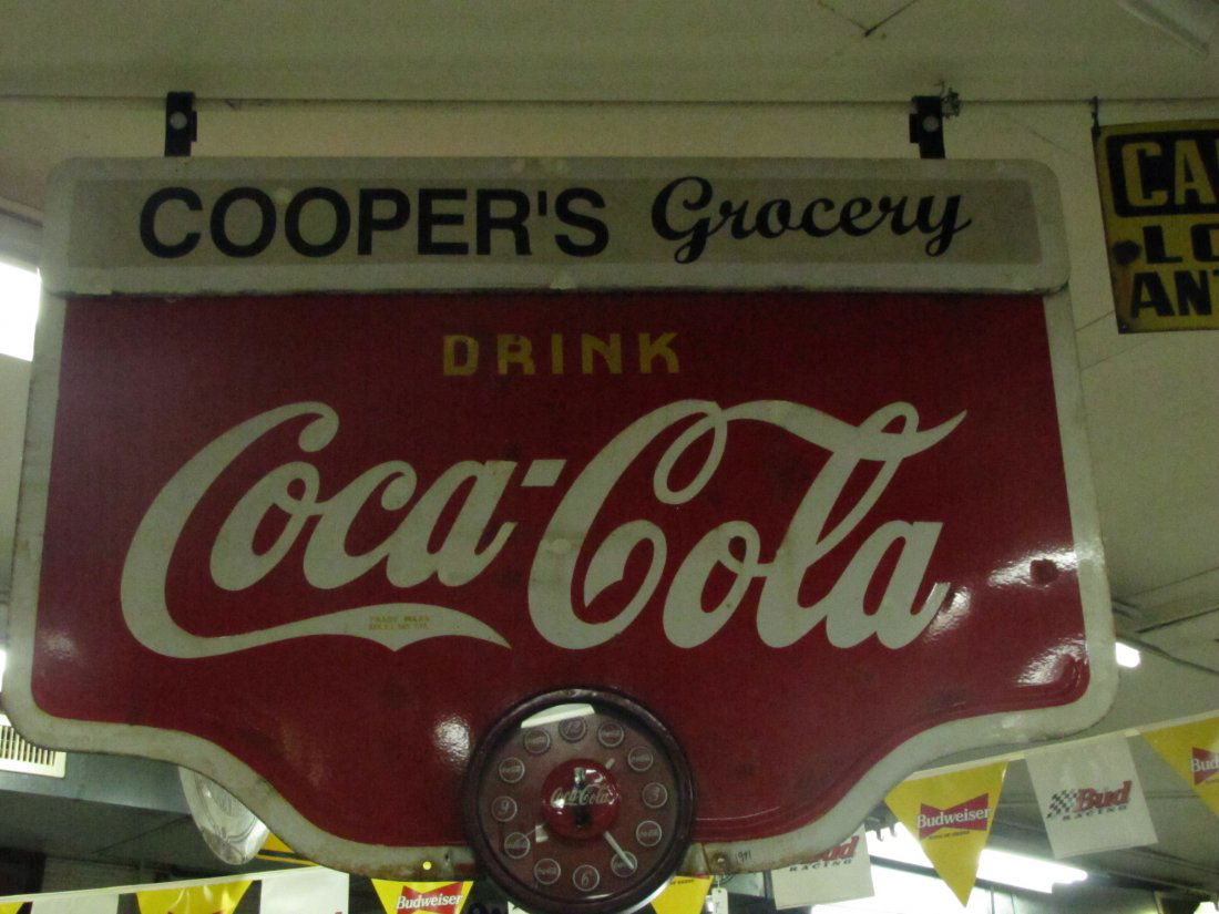1941 Double Sided Porcelain Coca Cola Sign: '41 Double Sided Porcelain Coca Cola Sign This is a large Coke advertising sign. Double sided with a Coke clock bolted onto the front. It says "COOPER'S GROCERY, DRINK COCA-COLA". There are two top ho