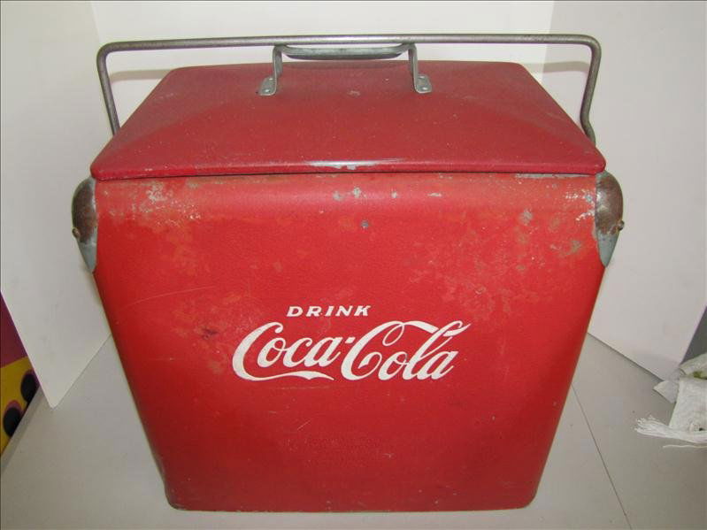 Drink Coca Cola Cooler: Drink Coca Cola Cooler Acton Mfg Co, Arkansas City, Kansas, pat pending. Trademarked with logos on front and back. Steel movable handle with side bottle opener. Removable pot metal tray with insulated