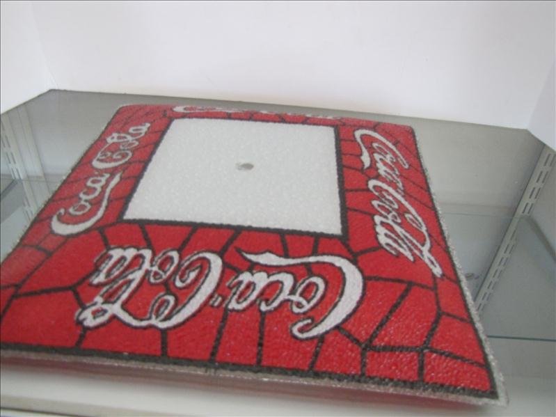 Coca Cola Glass Ceiling Light Fixture: Coca Cola Glass Ceiling Light Fixture This is a textured glass shade for overhead lighting. This has a hole for mounting. This measures 13.75" square.