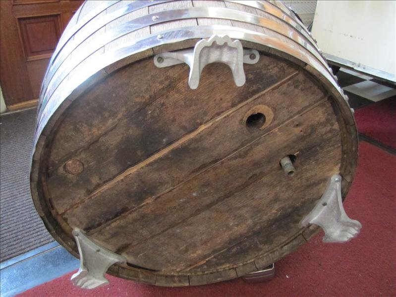 Large Vintage Root Beer Barrel: Large Vintage Root Beer Barrel The barrel has cast metal feet, base drain, and aluminum lining. This has stainless steel bands with removable lid. There is a front wooden spout that was a later additi