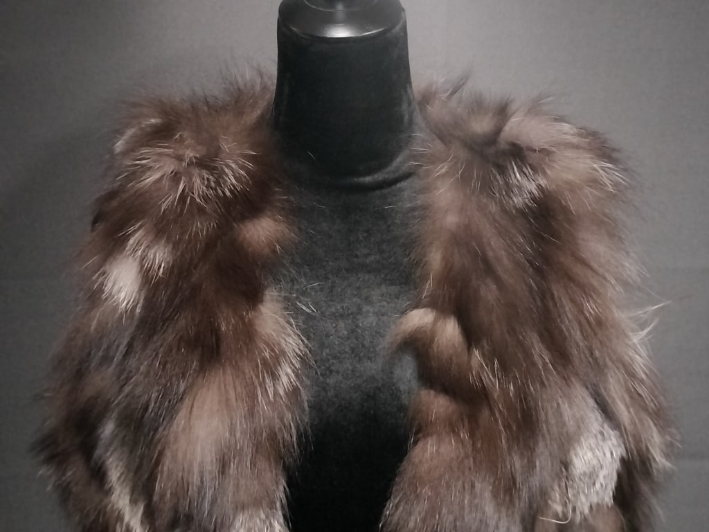 Metric knits clearance fur vest