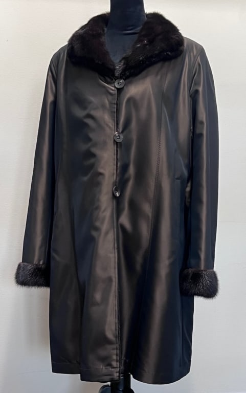 Fur Lined Car Coat: Car coat with fur lining, collar and cuffs, button close, see photos. Appears to be reversible and measures 17-inches-wide across shoulders, 25 3/4-inch-long sleeves, 37-inches-long.
