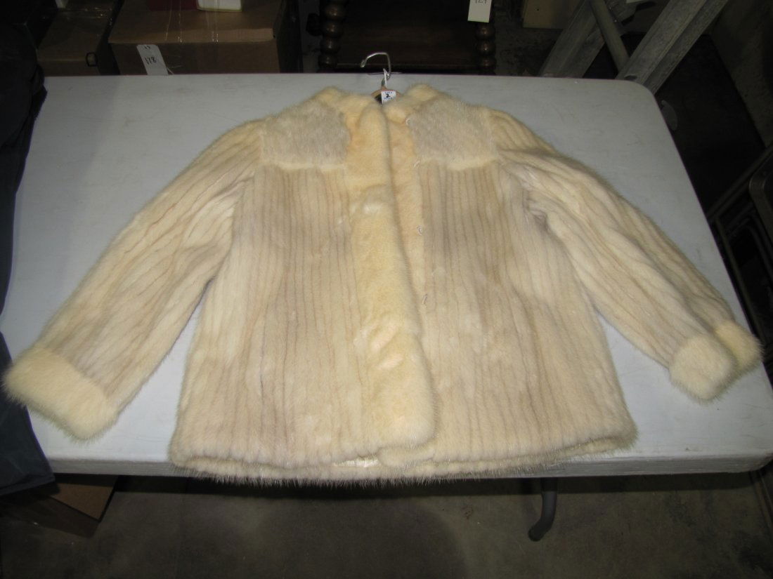 Natural Azurene & White Mink Fur Coat: A natural fur coat made from white mink. The sleeve is 15" from the pit to the tip of the sleeve. The length is 26" from the top of the collar to the bottom of the jacket. The shoulder width is 14" fr
