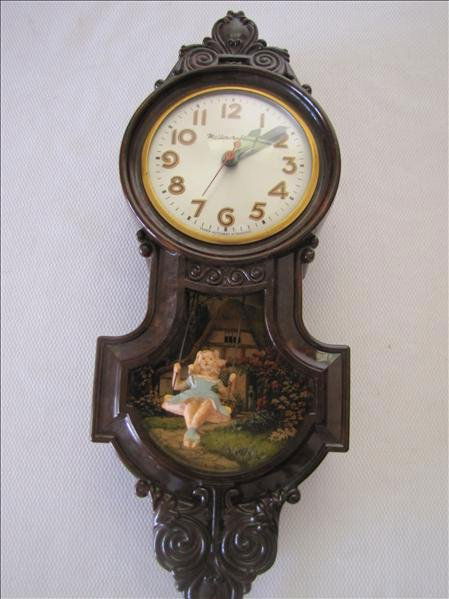 1940's Mastercraft "Girl on a Swing" Clock: 1940's Mastercraft "Girl on a Swing" Clock By the 1940's, clocks were elaborate figural displays for mantles or walls, including everything from ships and steering wheels, to stagecoaches and horses,