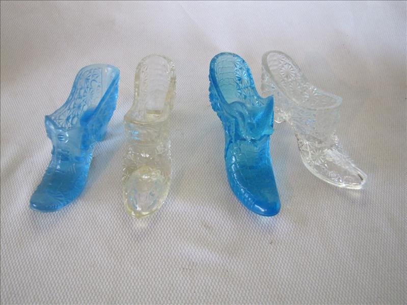 Lot of 4 Daisy & Button Glass Slippers: Lot of 4 Daisy & Button Glass Slippers 4 Blue EAPG Glass Daisy & Button Slippers Vintage Fenton Glass Blue Hobnail Cat Head Slipper Art Glass glass slipper in blue hobnail by Fenton Art Glass. The sli