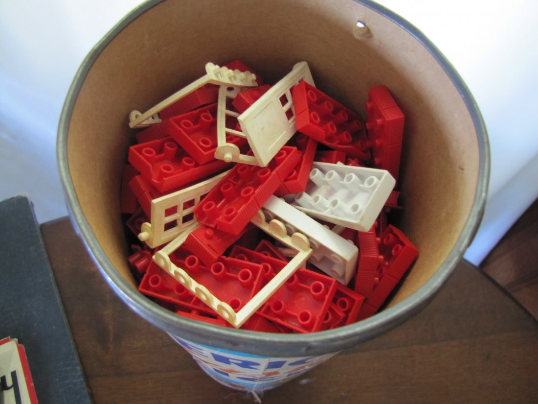 Vintage Toys & Monopoly Board Game: Vintage Toys & Monopoly Board Game This includes a large container of Elgo American Plastic Bricks, 3 Victory Wood Jigsaw Puzzles and a 1951 Monopoly game. Pieces are as pictures. Unsure if all are co