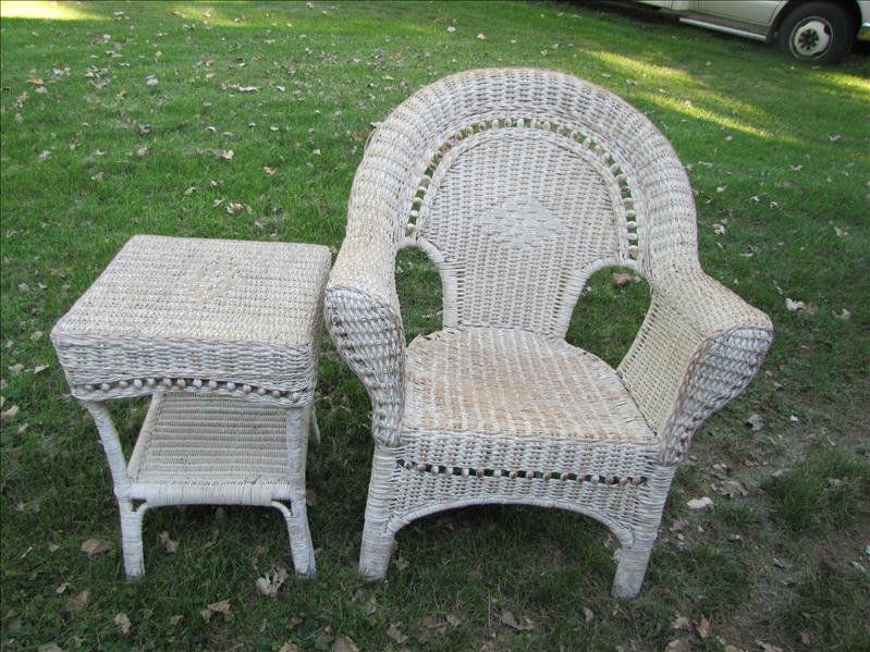 White Wicker Chair and Table: White Wicker Chair and Table This set includes a white wicker high back chair and matching table. Each piece has brown wicker tinting. The chair measures 3 ft tall x 30" x 23". The table measures 23"