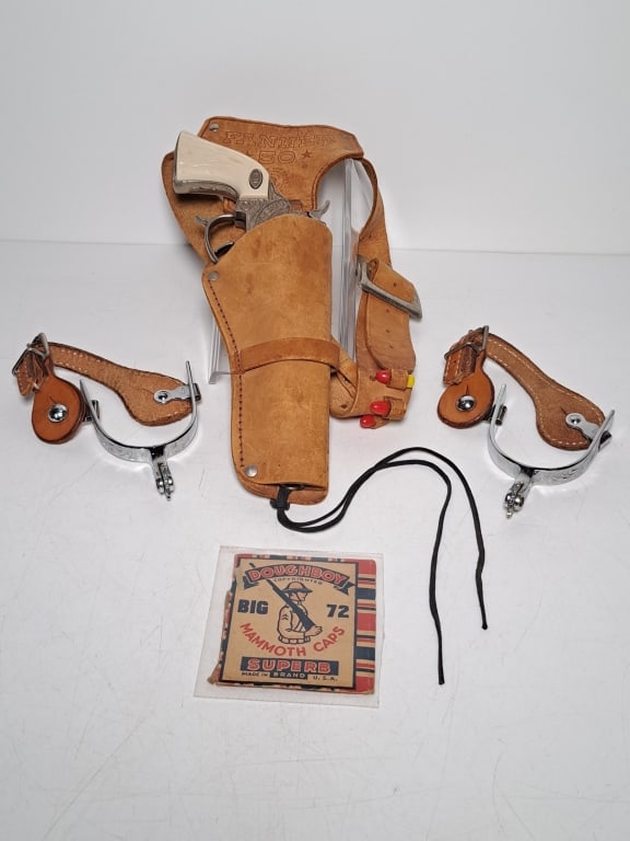 Gene Autry Cap Gun, Holster, Spurs: Gene Autry cap gun, functions properly, 44 L-H, comes with Fanner 50 cowhide holster, pair of spurs with leather straps, includes Doughboy Big 72 Monmouth caps, cap box has wear, see photos for condit