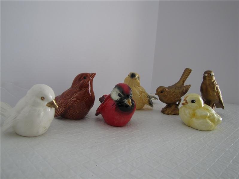Assorted Bird Figurines: Assorted Bird Figurines. (5) of the figurines are Goebel. The other two bird figures are Noritake. The two gold colored birds are the Noritake. They all measure approximately 3" tall.