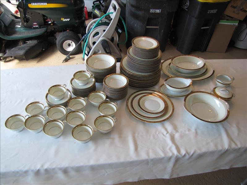 Gold Trim Noritake China Set: Gold Trim Noritake China Set. 13 tea cups at 4" wide and 2.25" tall. 14 saucers for the tea cups. 12 dinner plates at 10.5". 12 Salad plates at 8". 11 dessert plates at 6.25". 11 bowls at 7.5". 12 sou