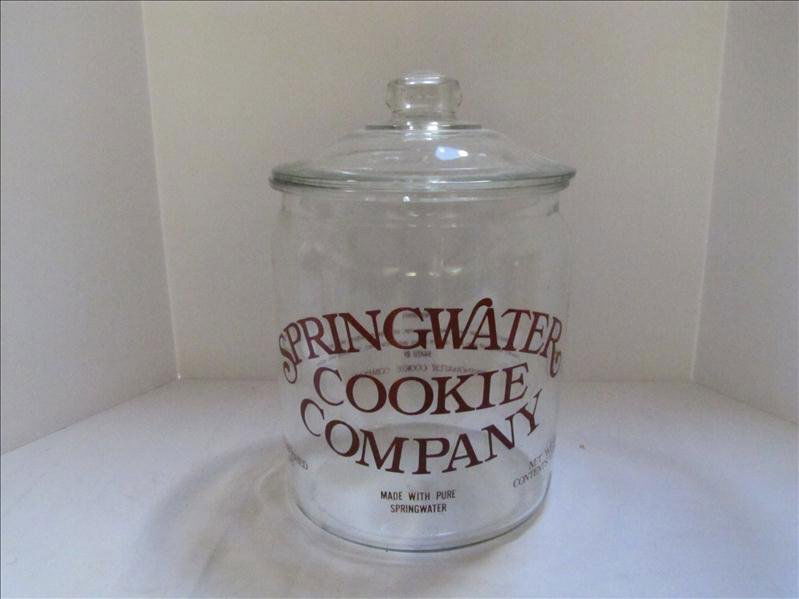 Springwater Cookie Co. Glass Cookie Jar: Springwater Cookie Co. Glass Cookie Jar 13" tall with the lid and 9" in diameter. Springwater cookie company printed on the front and cookie ingredients printed on the reverse side of the jar.