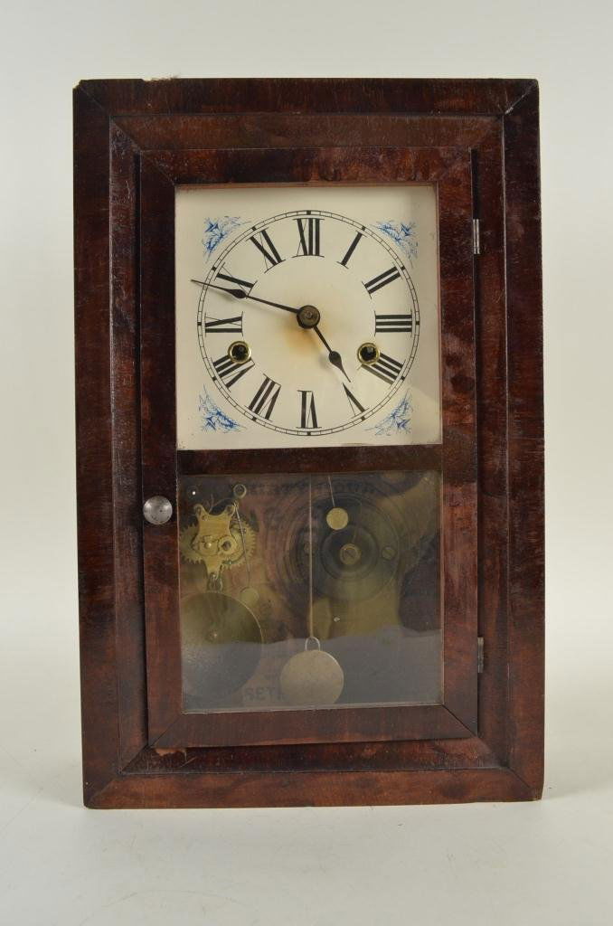 Seth Thomas Mantel Clock: Seth Thomas thirty-hour mantel clock. There are some chips to the wood in the corners of the box. Slight yellowing to the center of the face.