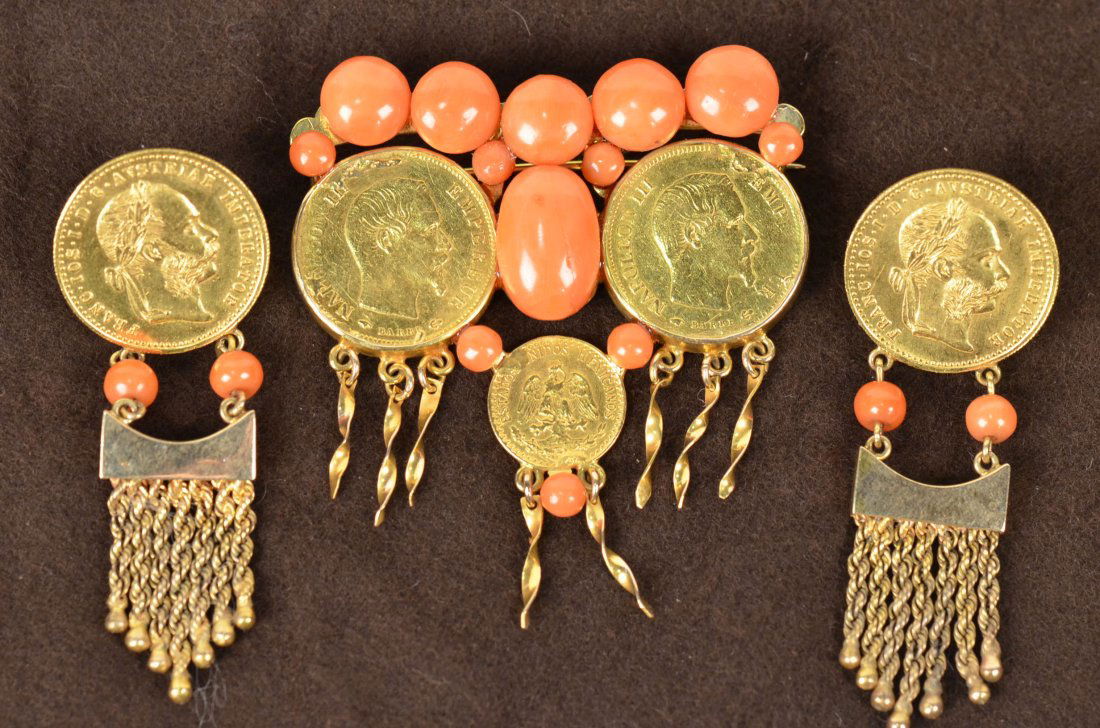 (3) pcs. Gold Franc Coin Pin Set: Large broach is made up of two ten Frank coin dated 1857, 1859, and a dos pesos coin. Set in a 14 kt gold pin frame. The two smaller earrings have 14 kt markings on the clasps. Both coins dated 1915.