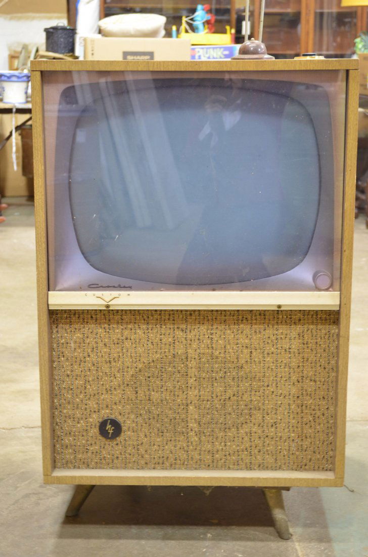 Vintage 1950's Crosley Custom hf TV: This is a very unique retro style television. Stands on four legs over the speaker and is on a swivel. TV measures 37.5" tall and 23.5" wide, and 21" deep.