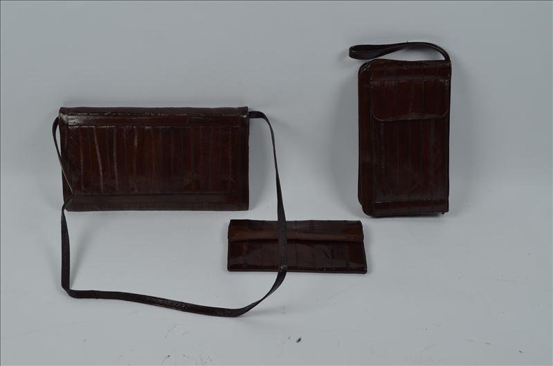 Ladies 3 piece purse set: Offered is a ladies 3 piece matching purse set. The brown eel skin has a pocketbook purse with matching clutch and another bag for eyeglasses, check book, credit cards, and etc.