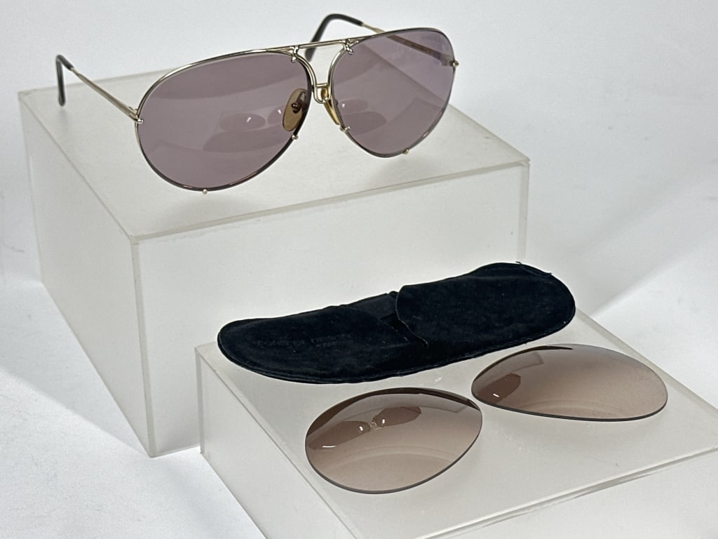 Porsche Design by Carrera Sunglasses: Porsche Design by Carrera Sunglasses. Embossed on left frame is OAN8113 Made in Austria 5621 46 135. Embossed on right frame is Porsche Design Carrera CAT NO 4 176 921. Sunglasses come in original har