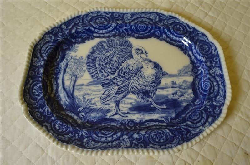 Copeland Flow Blue Turkey Platter: Offered is a large flow blue serving platter with turkey motif. Measures 19" by 13.75".