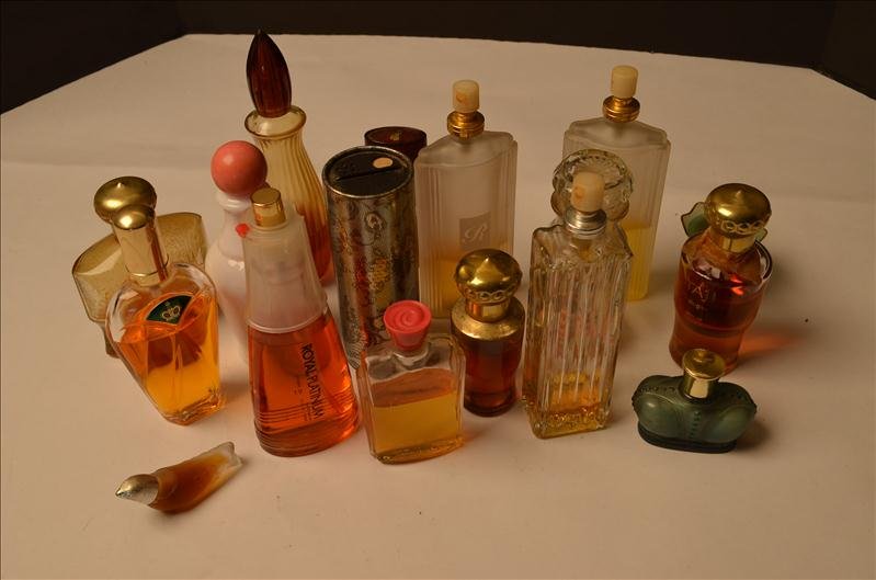 Large Lot of Perfume Bottles: Large Lot of Perfume Bottles Royal Platinum, Yardly, Moonlight Lace Powder, Romantic Allusions to name only a few. Many bottles still with contents.