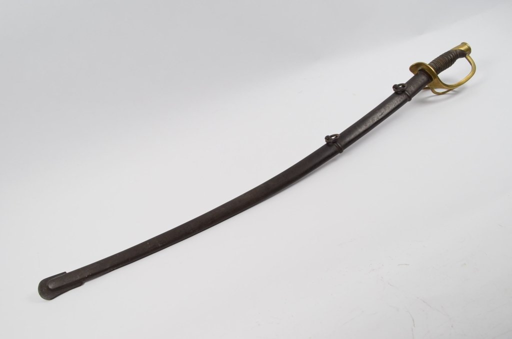 1861 Emerson & Silver Light Calvary civil war sword: This lot is for a 1861 Trenton New Jersey Civil War sword. Has no damage. Has original scabbard. Saddle rings in tact. Clearly stamped on the hilt Emerson & Silver Trenton N.J. Opposite side is stampe
