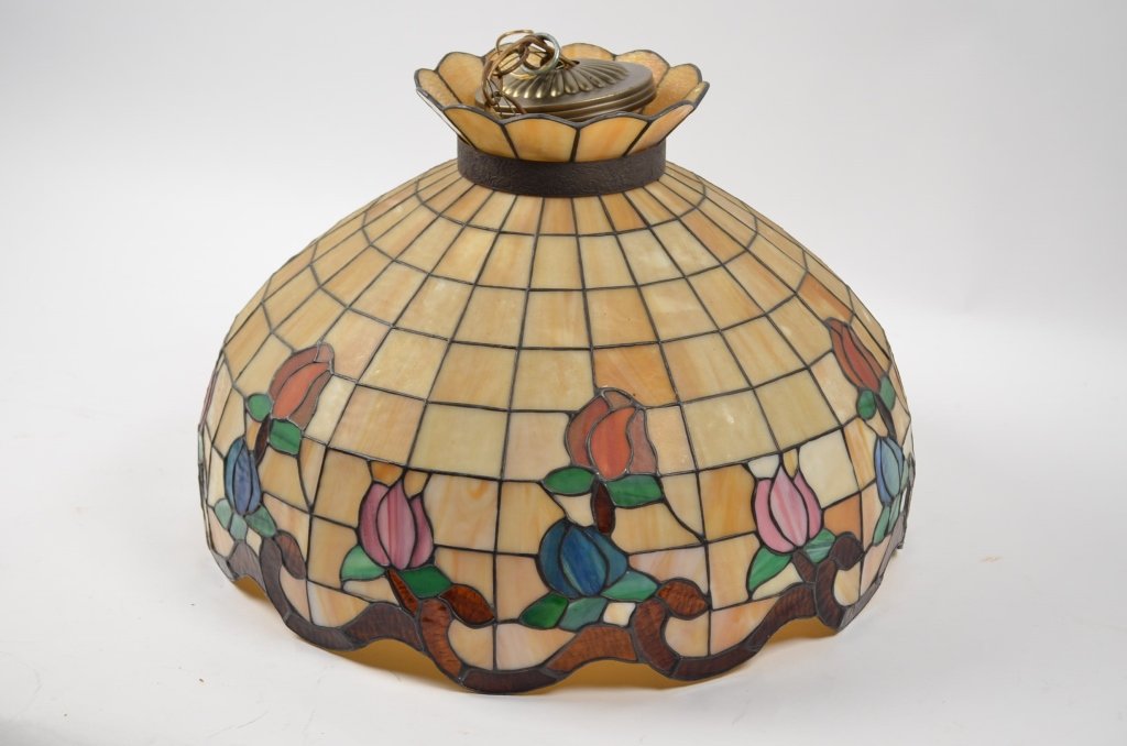 Large Stain Glass Hanging Light: Large stain glass hanging light. Light measures 20" in diameter. Excellent flower motif.