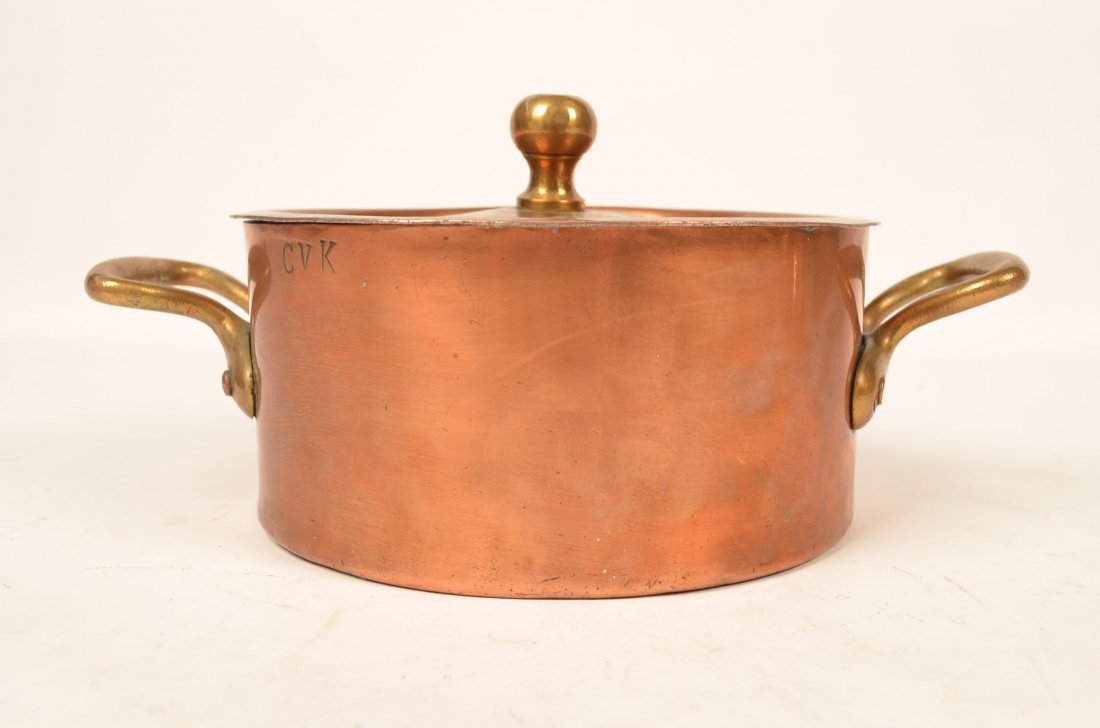Dehillerin Paris Copper Pot: Copper plated pot with brass accents handles and knob. Brass handles and knob are rivoted. Has a hammered bottom. On the lid of pot is marked "Dehillerin Rue Coquilliere Paris". The side of the pot is