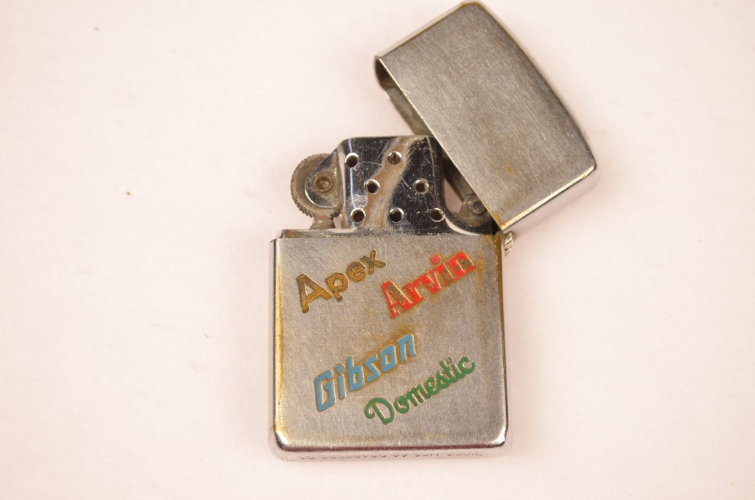 The National Mill Supply Inc. Zippo Lighter: Front side engraved with "The National Mill Supply Inc." inside company logo. Reverse side is engraved in color with "Apex, Arvin, Gibson, Domestic". Zippo Pat.2517191