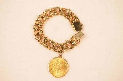 14kt Gold Bracelet W/ 20 Dollar Gold Liberty Coin: Ladies chain link style 14 karat gold bracelet with a 1896 20 dollar gold Liberty coin charm. Bracelet is marked in Arabic and was purchased in Egypt. Bracelet is approximately 8" long and weighs 154g