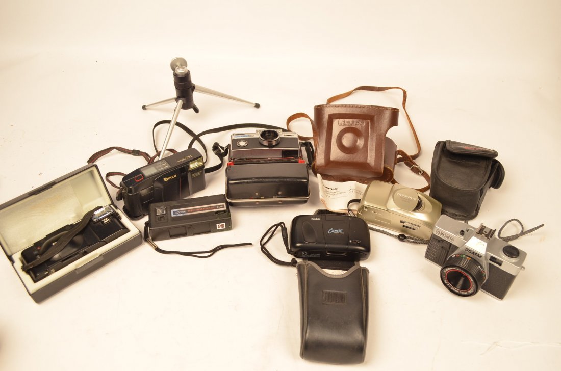 Lot of Misc. Cameras: Olympus camera. Yamasheta 35mm camera. Kodak Cameo Focus Free 35mm camera in case with instructions. Olympus Stylus Epic Zoom 170 camera in case. Ansco Flash Clipper camera. Kodak Tele-Instamatic 608 