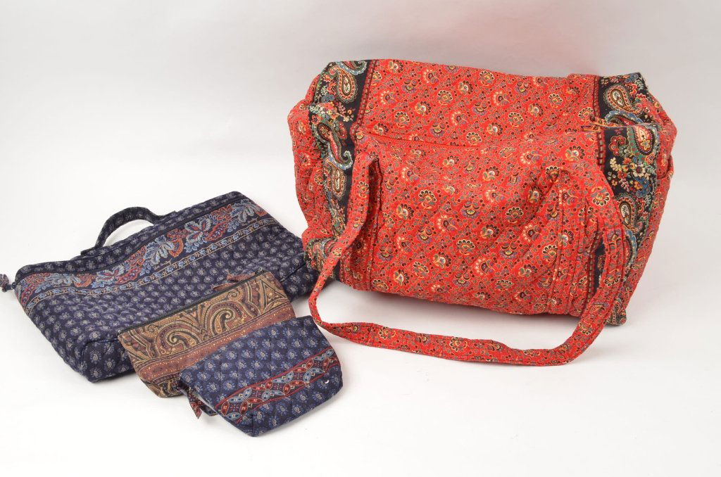 (4) Vera Bradley Bags: Ladies duffel tote, 2 small zippered bags, and a handled blue bag that is possibly for a laptop carrying pouch. All look to be in good condition.