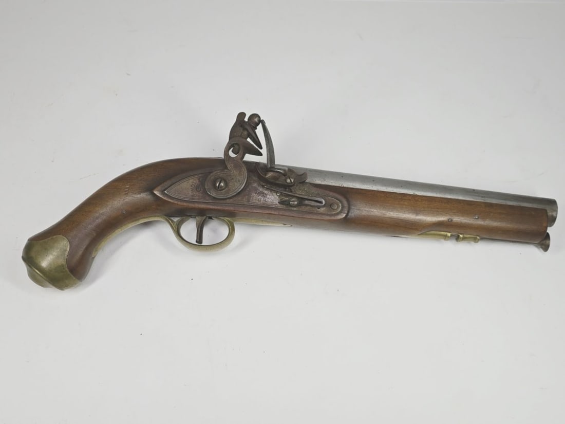 Antique Tower GR British Flintlock Pistol, .69 Cal: Antique Tower GR British Flintlock Pistol, .69 Cal. Barrel measures 9-in-long. Pistol is marked in part: Tower GR with a crown. No serial number. Condition: metal of pistol has surface dirt, rust mark