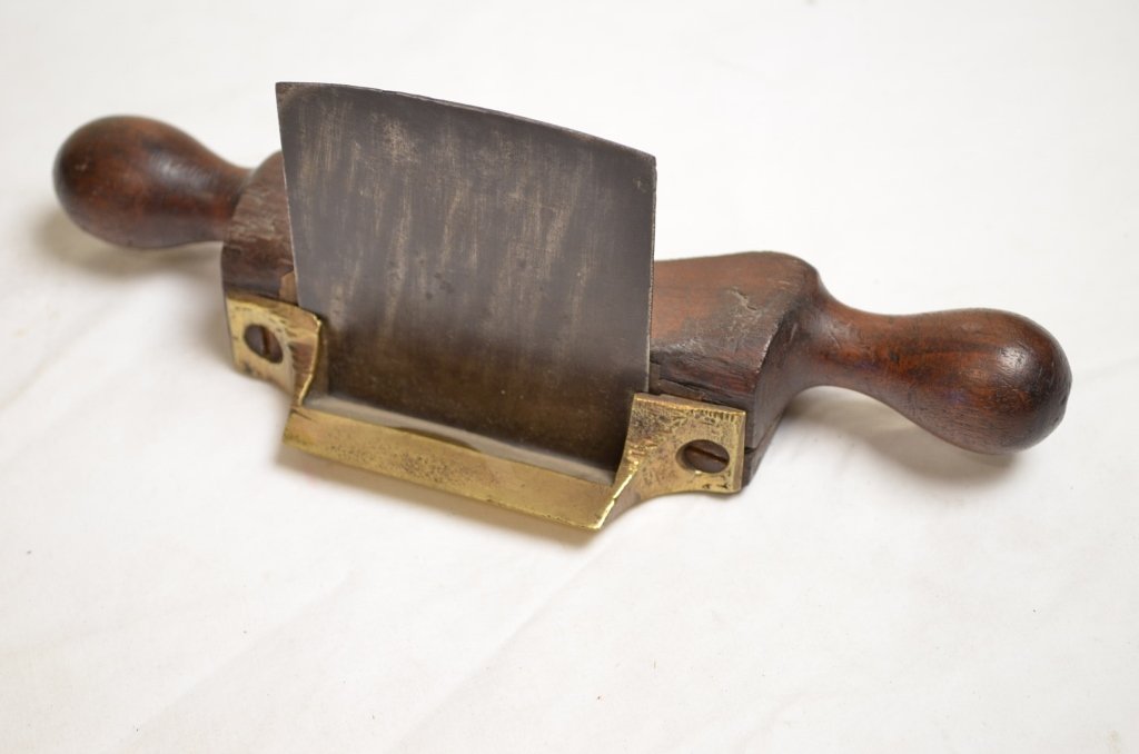 Early Primitive Plane: Brass bound. All single wood construction. Indicative of old English design. The plane is unmarked.