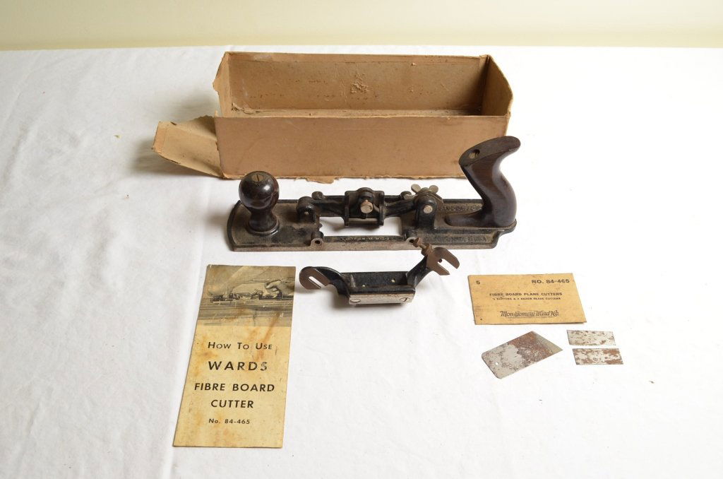 Wards Fiber Board Cutter Plane: Wards fiber board cutter plane. Manufactured by Montgomery Co. Comes in original box, instruction pamphlet, holder, and slitting and razor blade cutters in original packet. Box has no lid.