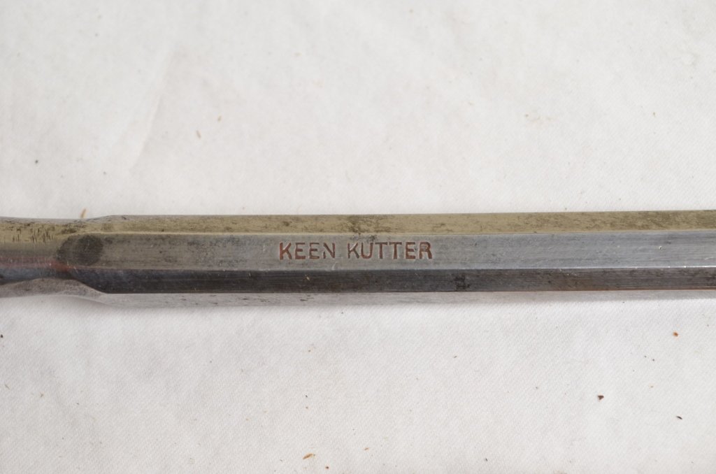 E. C. Simmons/ Keen Kutter Chisels: Both have original handle. Each bears the logo E.C. Simmons or Keen Kutter logo.