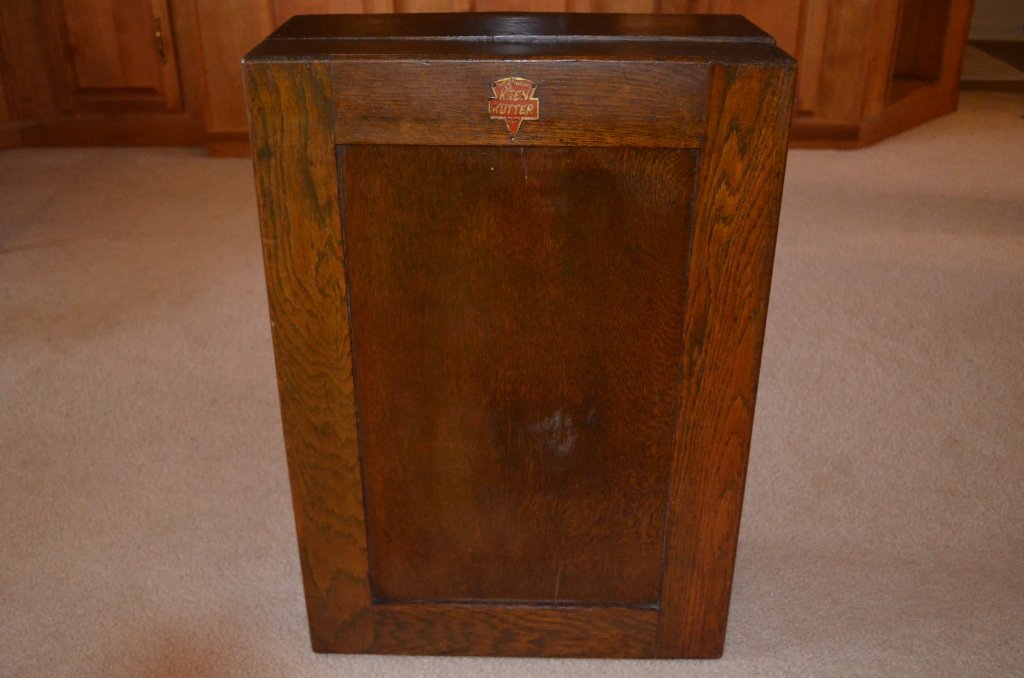 Keen Kutter Oak Wall Hanging Tool Cabinet: Keen Kutter logo plate on front. One pull out drawer. Without tools. Cabinet measures 19" W, 27"H, 8.5"D.