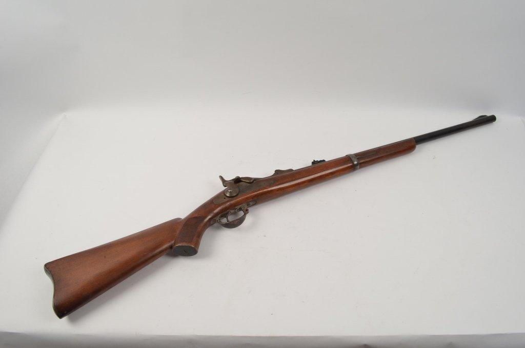 1873 Springfield Trapdoor Rifle: Contact Bud's Fishin Hole for shipping quote. A very collectable Model 1873 Springfield rifle. The barrel has been tapped and drilled to accommodate newer sights. No serial No. is marked. Good overall