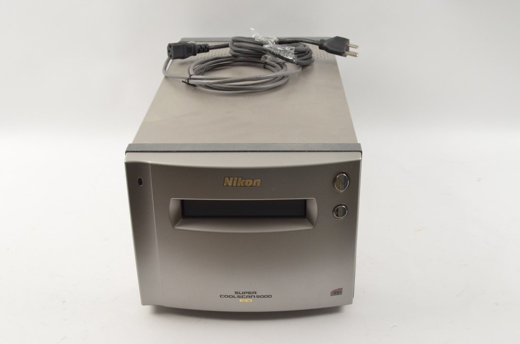 Nikon Super CoolScan 9000 ED Film Scanner: Contact Pak Mail (260) 637-4809 for shipping quote prior to bidding. Nikon Super Coolscan 9000 has a power cord and USB connector cord. Serial No. 413015 A high-performance dedicated film scanner desi