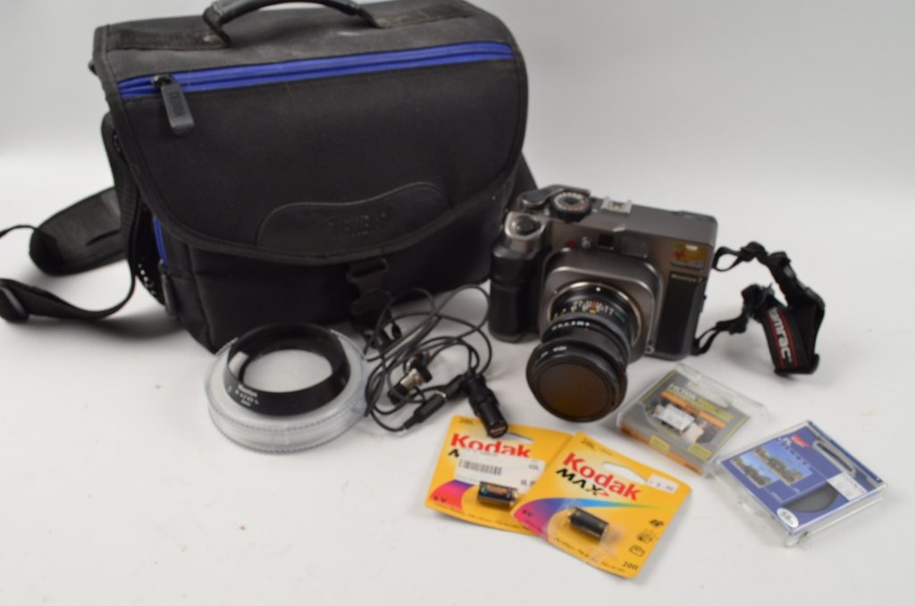 Mamiya 7 Camera w/ 65mm Lens: $17 Shipping/handling/insurance (up to $100) shipped in the continental United States. We do not combine multiple lots for shipping as the packages are sealed and labeled immediately after the item is