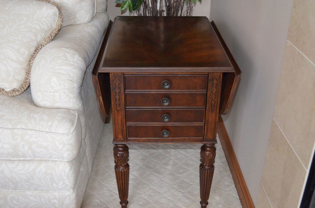 Hekman Drop Leaf End Table: Walnut, dove tailed two drawer drop leaf table with spindal legs. Measures 27" H X 27" D X 20" W (leaves down). Leaves measure 8"