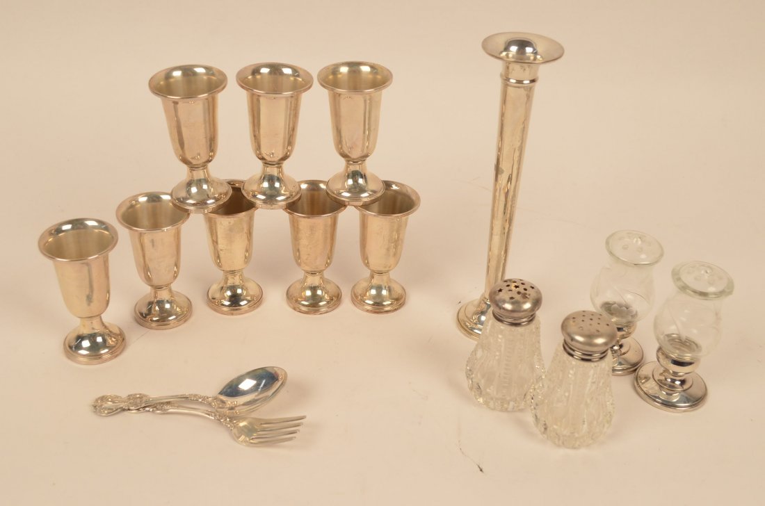 (8) Communion Cups, Candlestick, Salt & Peppers: $23 Shipping/handling/insurance (up to $100) shipped in the continental United States. We do not combine multiple lots for shipping as the packages are sealed and labeled immediately after the item is