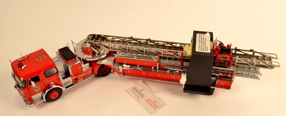 Franklin Mint 1965 Fire Engine 1:32 Scale Die Cast: $20 Shipping/handling/insurance (up to $100) shipped in the continental United States. We do not combine multiple lots for shipping as the packages are sealed and labeled immediately after the item is