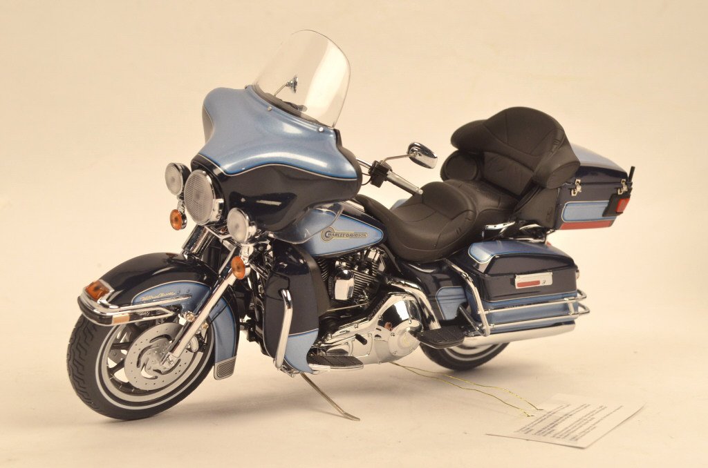 Harley-Davidson Ultra Classic Electra Glide 1:10: $18 Shipping/handling/insurance (up to $100) shipped in the continental United States. We do not combine multiple lots for shipping as the packages are sealed and labeled immediately after the item is