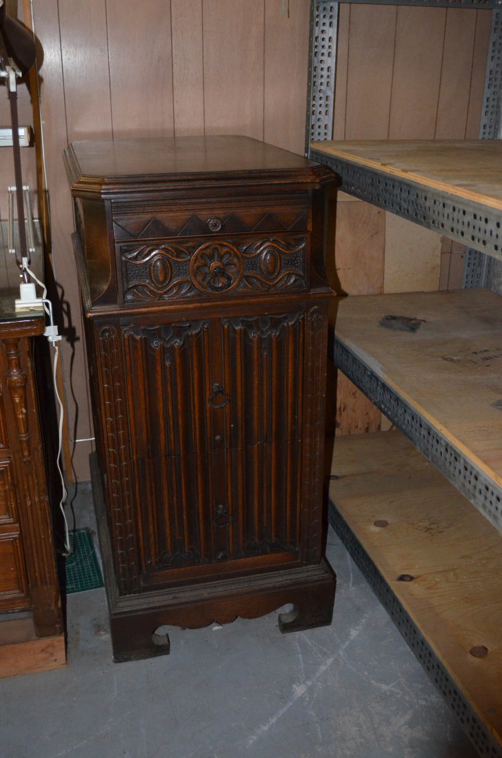 Antique Filing Cabinet: Antique wooden filing cabinet. THIS ANTIQUE WOODEN FILING CABINET IS LOCATED IN THE BASEMENT OF A HOME IN FORT WAYNE, INDIANA. WINNING BIDDER IS RESPONSIBLE FOR REMOVAL AND CORDINATING WITH REMOVAL TI
