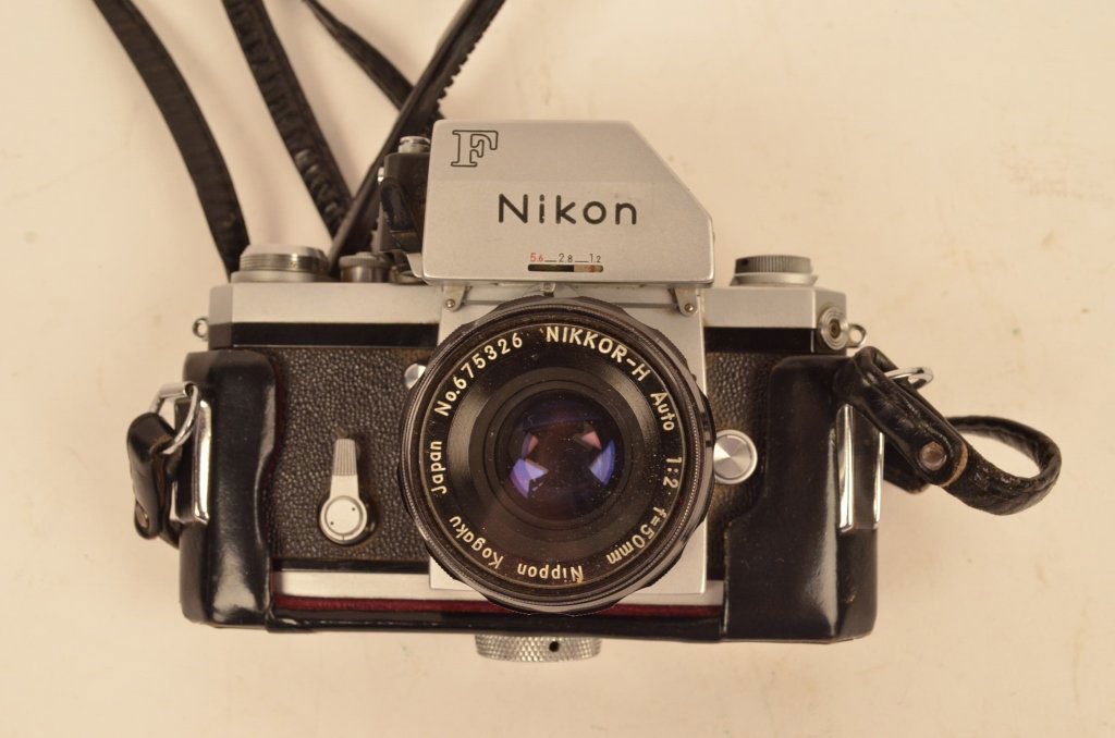 Nikon Camera No.675326 NIKKOR-H Auto 1:2 F=50mm: $25 Shipping/handling/insurance (up to 100) shipped in the continental United States. We do not combine shipping as the packages are sealed and labeled immediately after the item is sold. Internationa