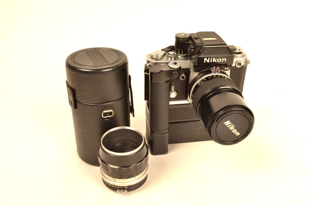 Nikon AS Camera w/ Extra Lens: $22 Shipping/handling/insurance (up to 100) shipped in the continental United States. We do not combine shipping as the packages are sealed and labeled immediately after the item is sold. Internationa